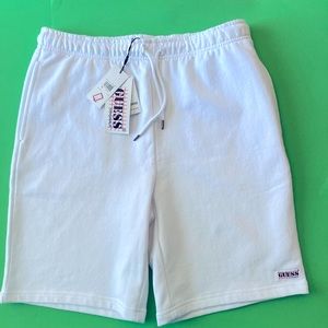 GUESS. Cotton shorts. Waist tie. 2 nice side pockets & 1 zippered back pocket.